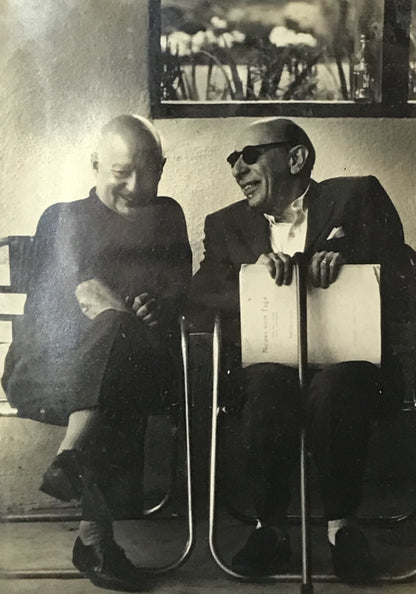 Vintage Black and White Photograph of Two Men in Conversation