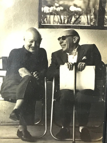 Vintage Black and White Photograph of Two Men in Conversation