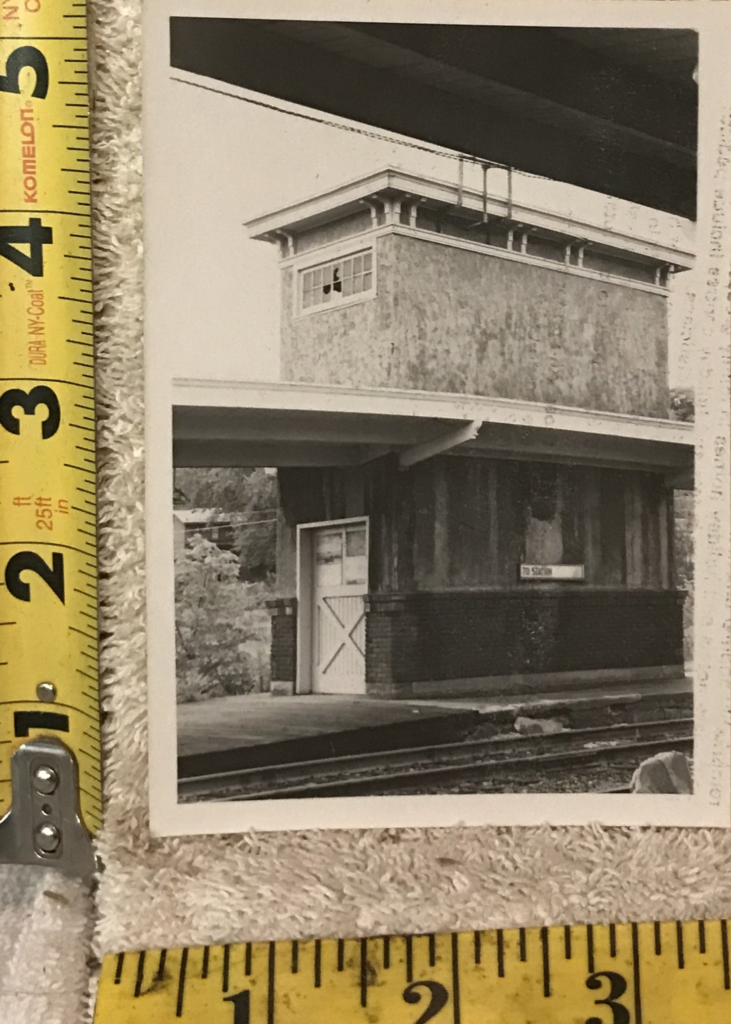 Vintage Black & White Photograph of a Train Station Platform Building