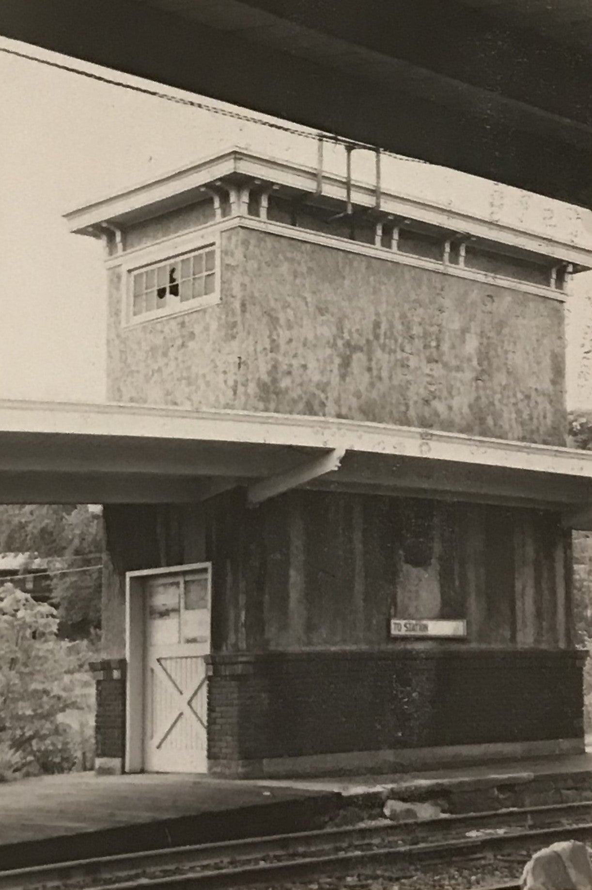 Vintage Black & White Photograph of a Train Station Platform Building